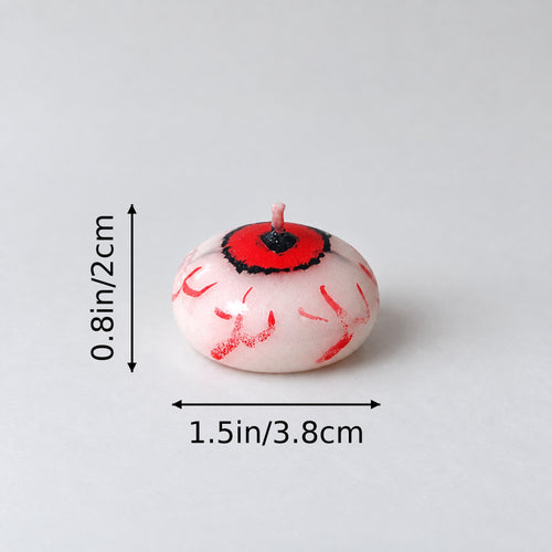 Eyeball candle size: 1.5 in (3.8 cm) wide, 0.8 in (2 cm) tall